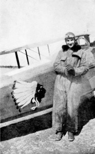 James Norman Hall standing next to his biplane with the logo of the Lafayette Escadrille Lafayette Escadrille escadrille emblem